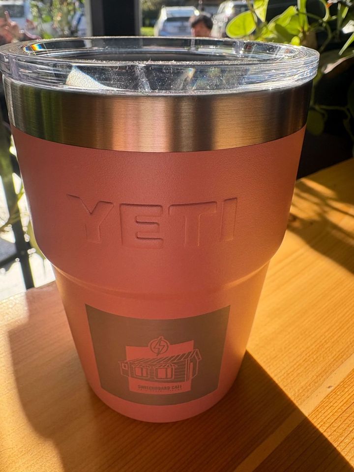 A YETI tumbler with the Switchboard cottage on it